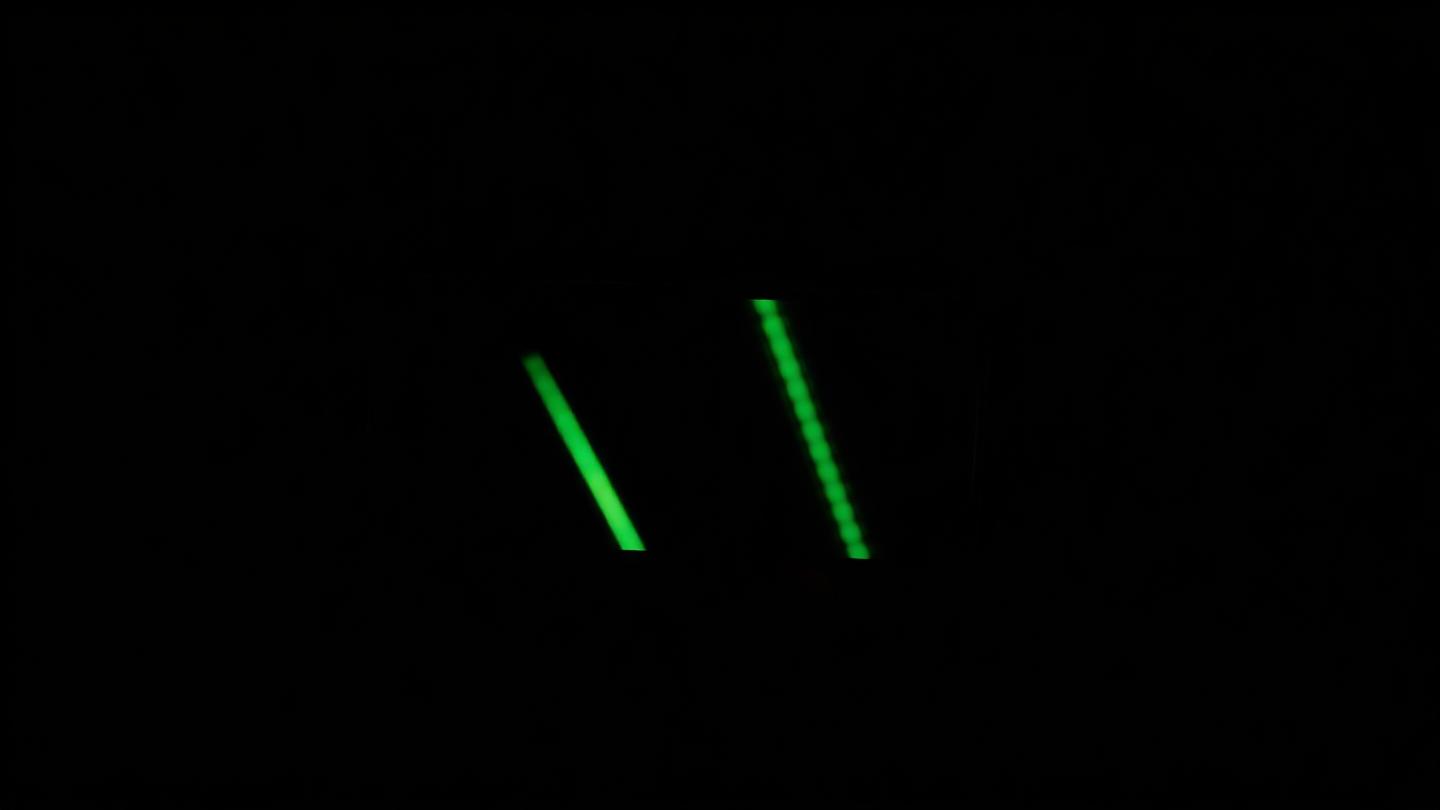 Stylised TikTok icon on a dark background.